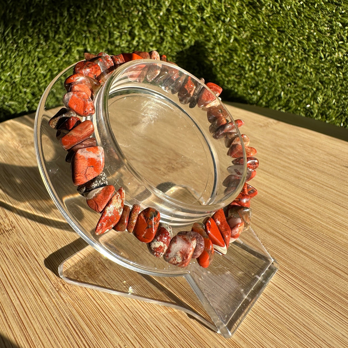 Red Jasper chip bracelet with deep‑red tones for grounding, strength, and emotional stability