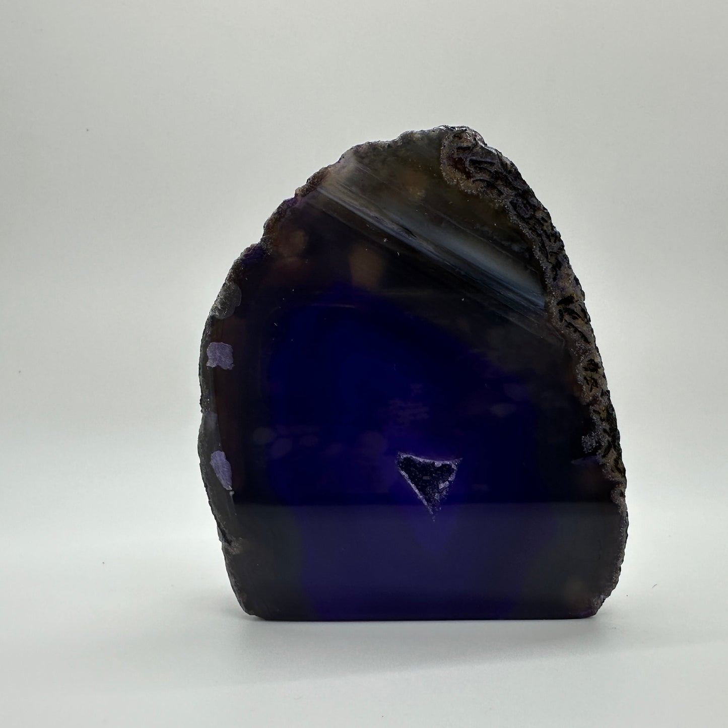 Purple agate end displayed as a calming, intuitive gift with vibrant colour and soothing presence