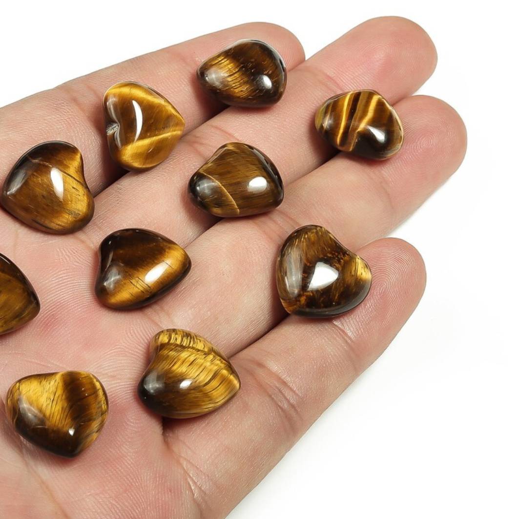 Polished Tiger’s Eye heart with golden‑brown bands for grounding, strength, and protection