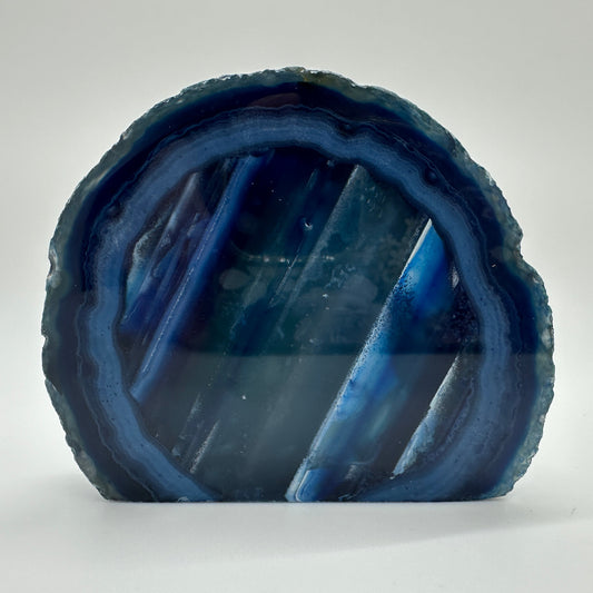 Polished blue agate end with crystalline centre — symbol of calm, balance, and gentle protection