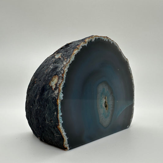 Teal agate end with polished surface and soothing teal banding for clarity and calm